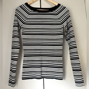 Philosophy ribbed/black & white striped/ form fitting sweater. Slight boat neck